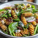 Fresh Spring Pasta Salad with Lemon Vinaigrette and Radishes, featuring tender pasta, bright greens, and tangy homemade dressing.  
