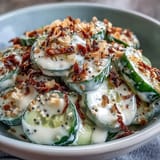 Cool sliced cucumbers tossed with creamy, savory everything bagel dressing.